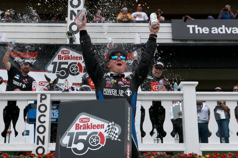 LONG POND, PENNSYLVANIA - JUNE 26: John Hunter Nemechek, driver of the #4 Power Up Premium Trail Mix Toyota, celebrates in victory lane after winning the NASCAR Camping World Truck Series CRC Brakleen 150 at Pocono Raceway on June 26, 2021 in Long Pond, Pennsylvania. (Photo by Sean Gardner/Getty Images) | Getty Images