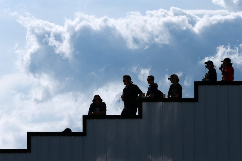 LONG POND, PENNSYLVANIA - JUNE 26: NASCAR team spotters watch the race during the NASCAR Cup Series Pocono Organics CBD 325 at Pocono Raceway on June 26, 2021 in Long Pond, Pennsylvania. (Photo by Sean Gardner/Getty Images) | Getty Images