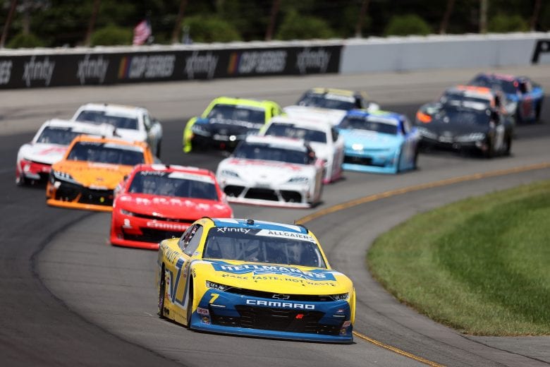 LONG POND, PENNSYLVANIA - JUNE 27: Justin Allgaier, driver of the #7 Hellmann's 100% Recycled Chevrolet, leads the field during the NASCAR Xfinity Series Pocono Green 225 Recycled by J.P. Mascaro & Sons at Pocono Raceway on June 27, 2021 in Long Pond, Pennsylvania. (Photo by James Gilbert/Getty Images) | Getty Images