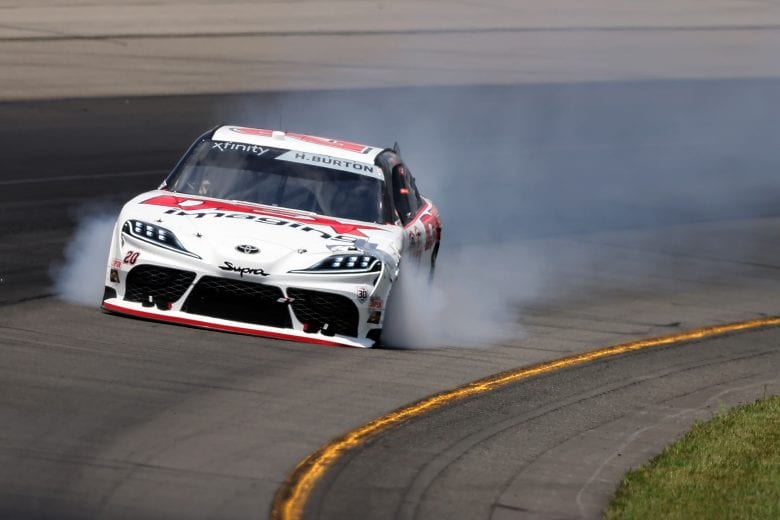 LONG POND, PENNSYLVANIA - JUNE 27: Smoke billows from Harrison Burton, driver of the #20 DEX Imaging Toyota, after an on-track incident during the NASCAR Xfinity Series Pocono Green 225 Recycled by J.P. Mascaro & Sons at Pocono Raceway on June 27, 2021 in Long Pond, Pennsylvania. (Photo by James Gilbert/Getty Images) | Getty Images