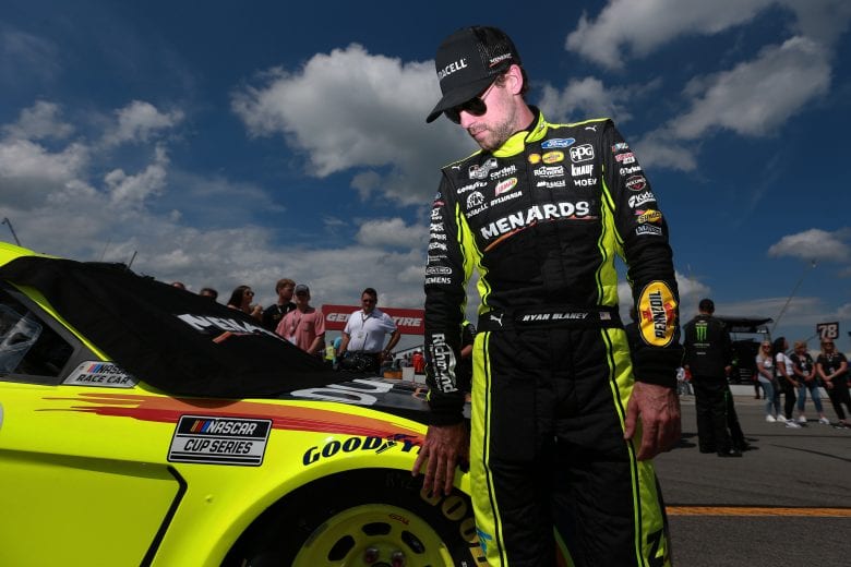 LONG POND, PENNSYLVANIA - JUNE 27: Ryan Blaney, driver of the #12 Menards/Duracell Ford, waits on the grid prior to the NASCAR Cup Series Explore the Pocono Mountains 350 at Pocono Raceway on June 27, 2021 in Long Pond, Pennsylvania. (Photo by Sean Gardner/Getty Images) | Getty Images