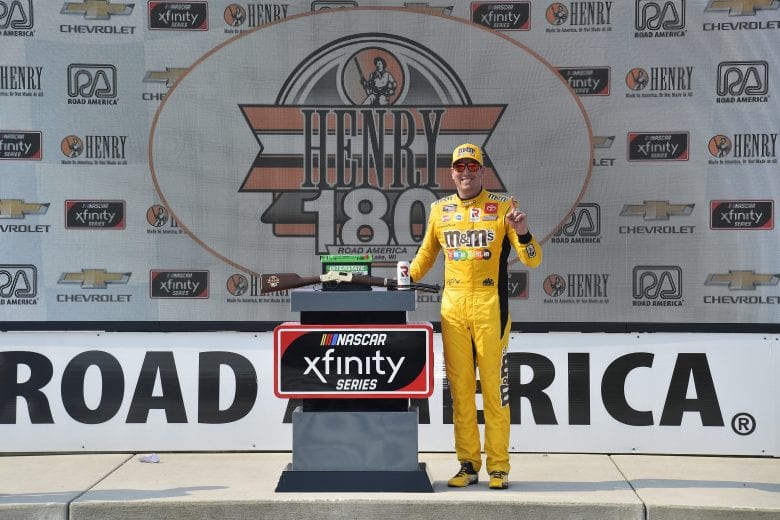 ELKHART LAKE, WISCONSIN - JULY 03: Kyle Busch, driver of the #54 M&M's Ice Cream Toyota, celebrates in victory lane after winning the NASCAR Xfinity Series Henry 180 at Road America on July 03, 2021 in Elkhart Lake, Wisconsin. (Photo by Logan Riely/Getty Images) | Getty Images
