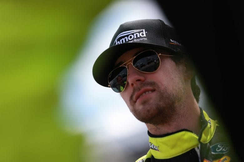 LONG POND, PENNSYLVANIA - JUNE 26: Ryan Blaney, driver of the #12 Menards/Richmond Ford, waits on the grid prior to the NASCAR Cup Series Pocono Organics CBD 325 at Pocono Raceway on June 26, 2021 in Long Pond, Pennsylvania. (Photo by Sean Gardner/Getty Images) | Getty Images