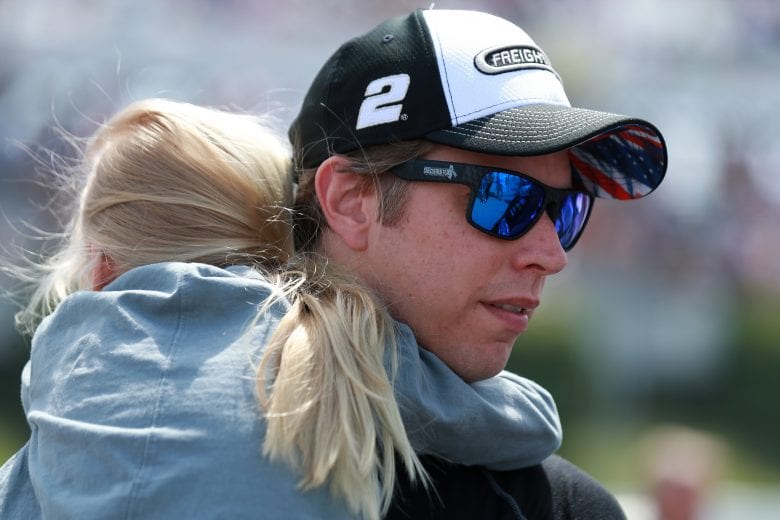 LONG POND, PENNSYLVANIA - JUNE 26: Brad Keselowski, driver of the #2 Detroit Engines Ford, and daughter, Scarlett walk the grid the NASCAR Cup Series Pocono Organics CBD 325 at Pocono Raceway on June 26, 2021 in Long Pond, Pennsylvania. (Photo by Sean Gardner/Getty Images) | Getty Images