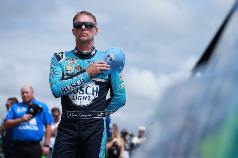 LONG POND, PENNSYLVANIA - JUNE 26: Kevin Harvick, driver of the #4 Ford, stands during the national anthem prior to the NASCAR Cup Series Pocono Organics CBD 325 at Pocono Raceway on June 26, 2021 in Long Pond, Pennsylvania. (Photo by Sean Gardner/Getty Images) | Getty Images