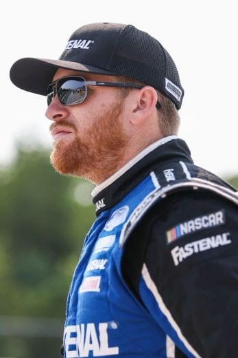 ELKHART LAKE, WISCONSIN - JULY 04: Chris Buescher, driver of the #17 Fastenal Ford, walks the grid during qualifying for the NASCAR Cup Series Jockey Made in America 250 Presented by Kwik Trip at Road America on July 04, 2021 in Elkhart Lake, Wisconsin. (Photo by James Gilbert/Getty Images) | Getty Images
