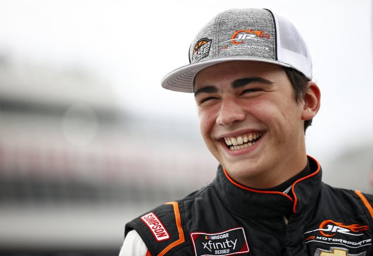 LOUDON, NEW HAMPSHIRE - JULY 17: Sam Mayer, driver of the #8 Chevrolet, laughs on the grid prior to the NASCAR Xfinity Series Ambetter Get Vaccinated 200 at New Hampshire Motor Speedway on July 17, 2021 in Loudon, New Hampshire. (Photo by Jared C. Tilton/Getty Images) | Getty Images