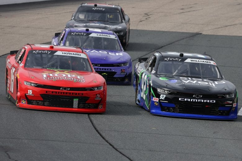 LOUDON, NEW HAMPSHIRE - JULY 17: Colby Howard, driver of the #15 Project Hope Foundation Chevrolet, and Josh Williams, driver of the #92 Sleep Well/ANE Elctic Chevrolet, race during the NASCAR Xfinity Series Ambetter Get Vaccinated 200 at New Hampshire Motor Speedway on July 17, 2021 in Loudon, New Hampshire. (Photo by James Gilbert/Getty Images) | Getty Images