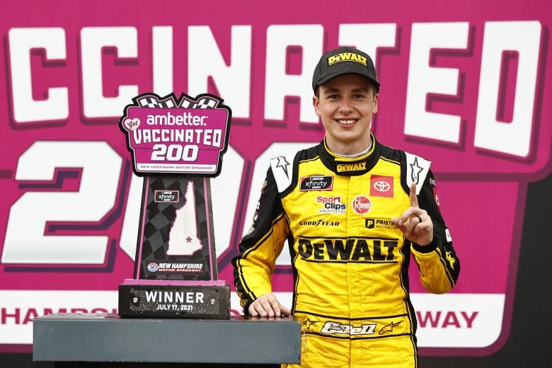 LOUDON, NEW HAMPSHIRE - JULY 17: Christopher Bell, driver of the #54 DEWALT Toyota,celebrates in victory lane after winning the NASCAR Xfinity Series Ambetter Get Vaccinated 200 at New Hampshire Motor Speedway on July 17, 2021 in Loudon, New Hampshire. (Photo by Jared C. Tilton/Getty Images) | Getty Images