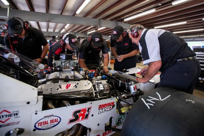 Crew for Jon McKennedy, driver of the #7 Ultra Wheel Chevrolet, work on their car during the Whelen 100 for the NASCAR Whelen Modified Series at New Hampshire Motor Speedway in Loudon, New Hampshire on July 17, 2021. (Paul Rutherford/NASCAR)