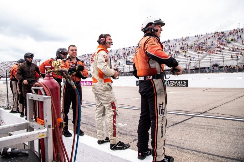 The pit crew team for Ryan Preece, driver of the #6 Riverhead Raceway Chevrolet, celebrate after winning the Whelen 100 for the NASCAR Whelen Modified Series at New Hampshire Motor Speedway in Loudon, New Hampshire on July 17, 2021. (Paul Rutherford/NASCAR)