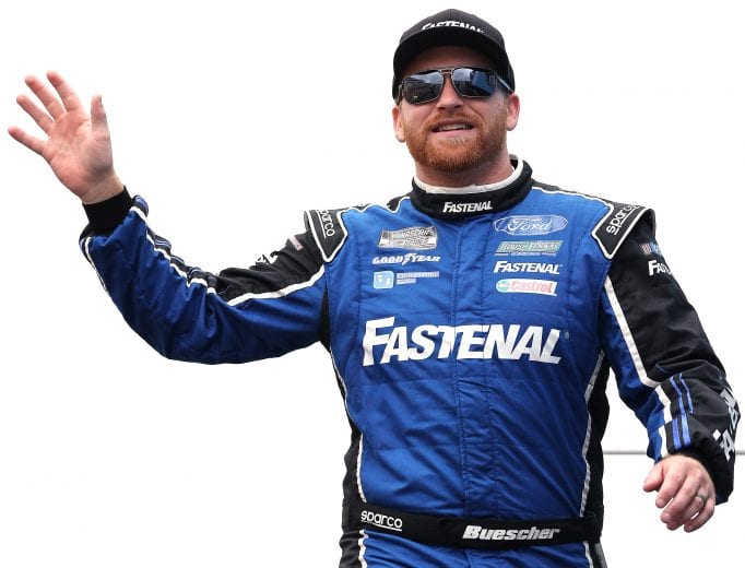 LOUDON, NEW HAMPSHIRE - JULY 18: Chris Buescher, driver of the #17 Fastenal Ford, waves to fans on stage during pre-race ceremonies prior to the NASCAR Cup Series Foxwoods Resort Casino 301 at New Hampshire Motor Speedway on July 18, 2021 in Loudon, New Hampshire. (Photo by James Gilbert/Getty Images) | Getty Images