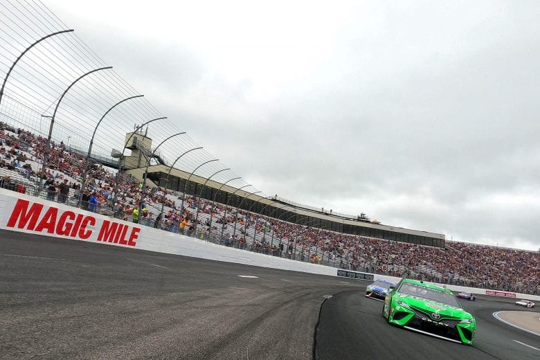 LOUDON, NEW HAMPSHIRE - JULY 18: Kyle Busch, driver of the #18 Interstate Batteries Toyota, leads the field on a pace lap prior to the NASCAR Cup Series Foxwoods Resort Casino 301 at New Hampshire Motor Speedway on July 18, 2021 in Loudon, New Hampshire. (Photo by James Gilbert/Getty Images) | Getty Images