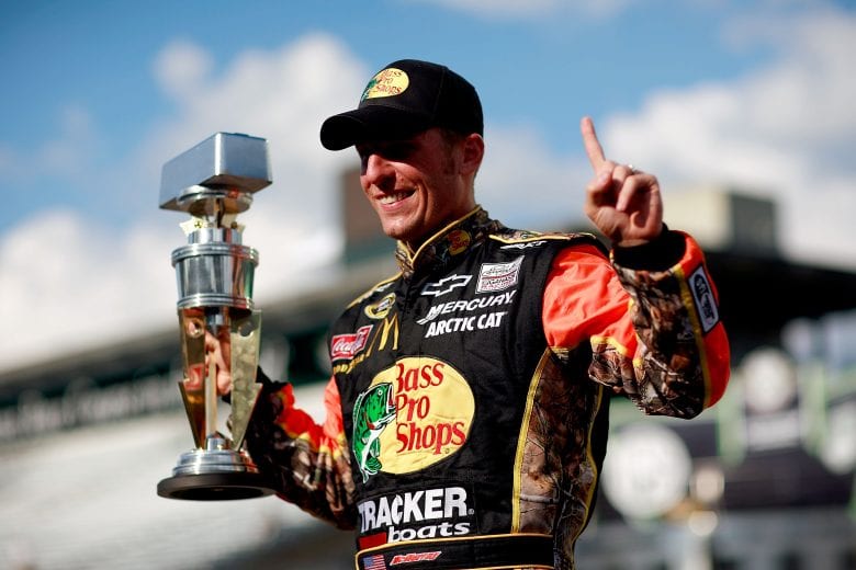INDIANAPOLIS - JULY 25:  Jamie McMurray, driver of the #1 Bass Pro Shops/Tracker Boats Chevrolet, celebrates winning the NASCAR Sprint Cup Series Brickyard 400 at Indianapolis Motor Speedway on July 25, 2010 in Indianapolis, Indiana.  (Photo by Tom Pennington/Getty Images for NASCAR) | Getty Images