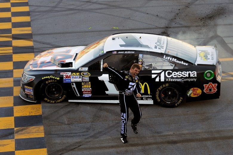 TALLADEGA, AL - OCTOBER 20:  Jamie McMurray, driver of the #1 Cessna Chevrolet, celebrates on track after winning the NASCAR Sprint Cup Series Camping World RV Sales 500 at Talladega Superspeedway on October 20, 2013 in Talladega, Alabama.  (Photo by Jared C. Tilton/NASCAR via Getty Images)