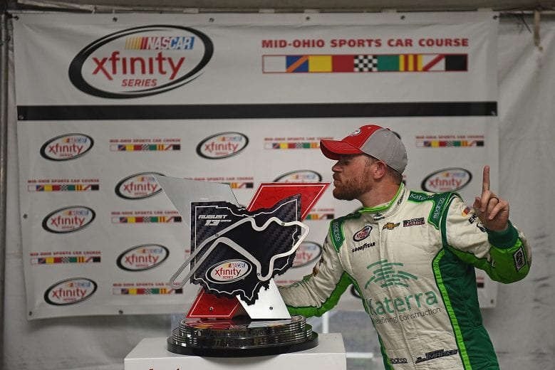 LEXINGTON OH - AUGUST 13: Justin Marks driver of the #42 Katerra Chevrolet celebrates in Victory Lane after taking first place in the 4th annual NASCAR XFINITY Series Mid-Ohio Challenge at Mid-Ohio Sports Car Course on August 13, 2016 in Lexington Ohio. (Photo by Jonathan Moore/Getty Images) | Getty Images