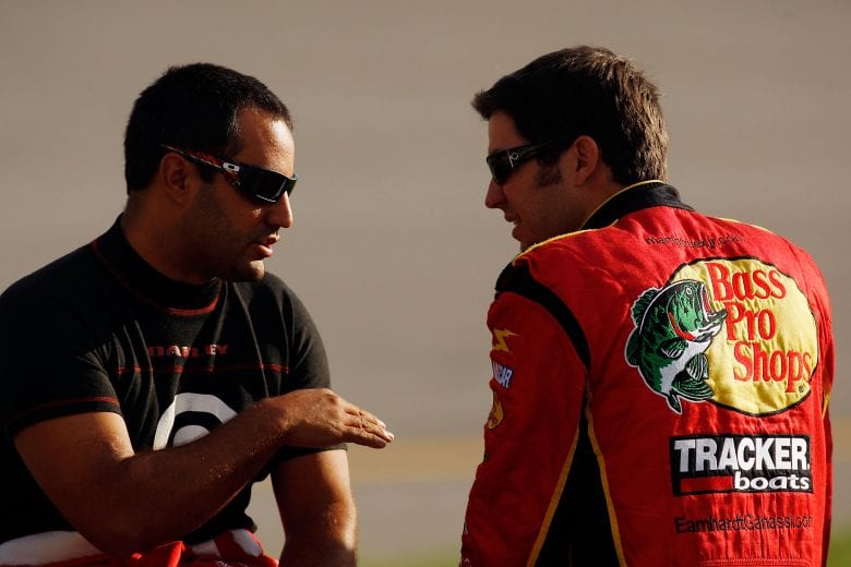 RICHMOND, VA - SEPTEMBER 11:  (L-R) Juan Pablo Montoya, driver of the #42 Target Chevrolet, speaks with Martin Truex Jr., driver of the #1 Bass Pro Shops Chevrolet, during qualifying for the NASCAR Sprint Cup Series Chevy Rock & Roll 400 at Richmond International Raceway on September 11, 2009 in Richmond, Virginia.  (Photo by Chris Graythen/Getty Images) | Getty Images