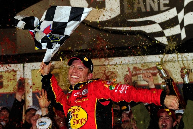 DAYTONA BEACH, FL - FEBRUARY 14:  Jamie McMurray, driver of the #1 Bass Pro Shops/Tracker Boats Chevrolet, celebrates in Victory Lane after winning the NASCAR Sprint Cup Series Daytona 500 at Daytona International Speedway on February 14, 2010 in Daytona Beach, Florida.  (Photo by Rusty Jarrett/Getty Images for NASCAR) | Getty Images