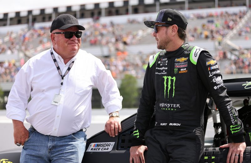 LONG POND, PENNSYLVANIA - JUNE 26: Kurt Busch, driver of the #1 Monster Energy Chevrolet, and team owner Chip Ganassi talk on the grid prior to the NASCAR Cup Series Pocono Organics CBD 325 at Pocono Raceway on June 26, 2021 in Long Pond, Pennsylvania. (Photo by James Gilbert/Getty Images) | Getty Images
