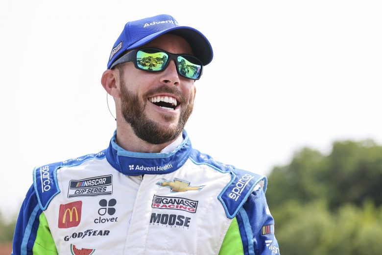ELKHART LAKE, WISCONSIN - JULY 04: Ross Chastain, driver of the #42 AdventHealth Chevrolet, laughs on the grid during qualifying for the NASCAR Cup Series Jockey Made in America 250 Presented by Kwik Trip at Road America on July 04, 2021 in Elkhart Lake, Wisconsin. (Photo by James Gilbert/Getty Images) | Getty Images