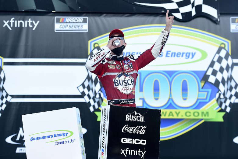 BROOKLYN, MICHIGAN - AUGUST 09: Kevin Harvick, driver of the #4 Busch Light Apple Ford, celebrates in Victory Lane after winning the NASCAR Cup Series Consumers Energy 400 at Michigan International Speedway on August 09, 2020 in Brooklyn, Michigan. (Photo by Jared C. Tilton/Getty Images) | Getty Images