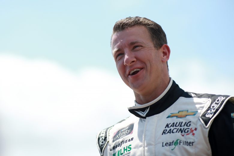 LONG POND, PENNSYLVANIA - JUNE 27: AJ Allmendinger, driver of the #16 Hyperice Chevrolet, waits on the grid prior to the NASCAR Xfinity Series Pocono Green 225 Recycled by J.P. Mascaro & Sons at Pocono Raceway on June 27, 2021 in Long Pond, Pennsylvania. (Photo by Sean Gardner/Getty Images) | Getty Images