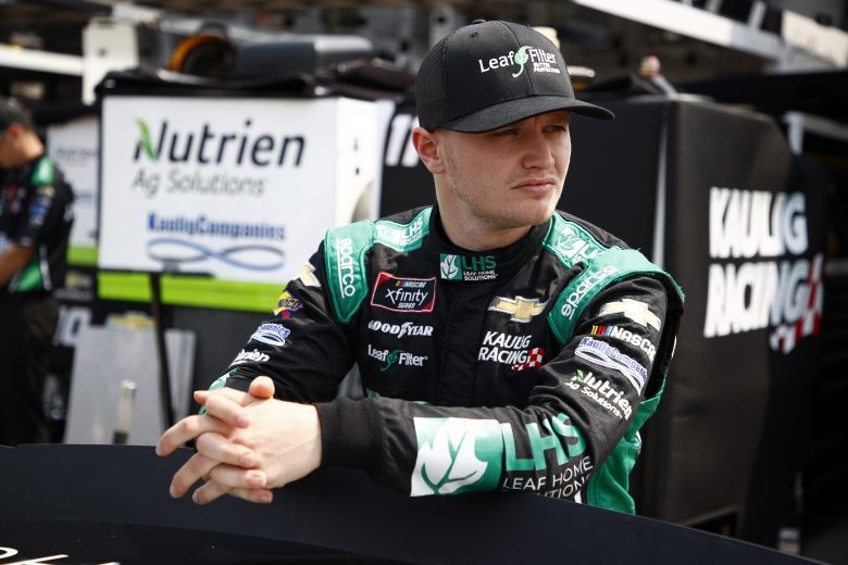 ELKHART LAKE, WISCONSIN - JULY 02: Justin Haley, driver of the #11 LeafFilter Gutter Protection Chevrolet, waits in the garage area during practice for the NASCAR Xfinity Series Henry 180 at Road America on July 02, 2021 in Elkhart Lake, Wisconsin. (Photo by Jared C. Tilton/Getty Images) | Getty Images