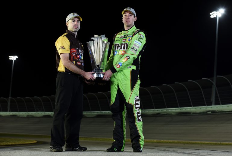 HOMESTEAD, FL - NOVEMBER 22: NASCAR Sprint Cup Series champion Kyle Busch, driver of the #18 M&M's Crispy Toyota, and crew chief Adam Stevens pose for a portrait at Homestead-Miami Speedway on November 22, 2015 in Homestead, Florida. (Photo by Jared C. Tilton/NASCAR via Getty Images)