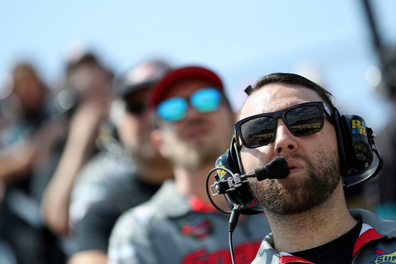 A crew member of Kyle Bonsignore, driver of the #22 Chateau Performance, Magnus, Tilton, and Wilwo Chevrolet, looks on during practice prior to the Nu Way Auto Parts 150 for the NASCAR Whelen Modified Tour at New York International Raceway Park in Lancaster, New York on July 31, 2021. (Bryan Bennett/NASCAR)