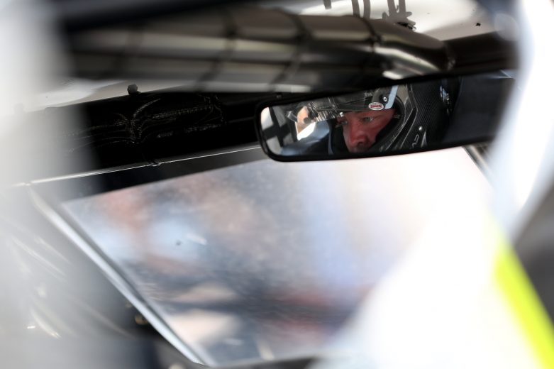 Patrick Emerling, driver of the #07 Captain Pip's Marina & Hideaway Troyer, sits in his car during practice prior to the Nu Way Auto Parts 150 for the NASCAR Whelen Modified Tour at New York International Raceway Park in Lancaster, New York on July 31, 2021. (Bryan Bennett/NASCAR)