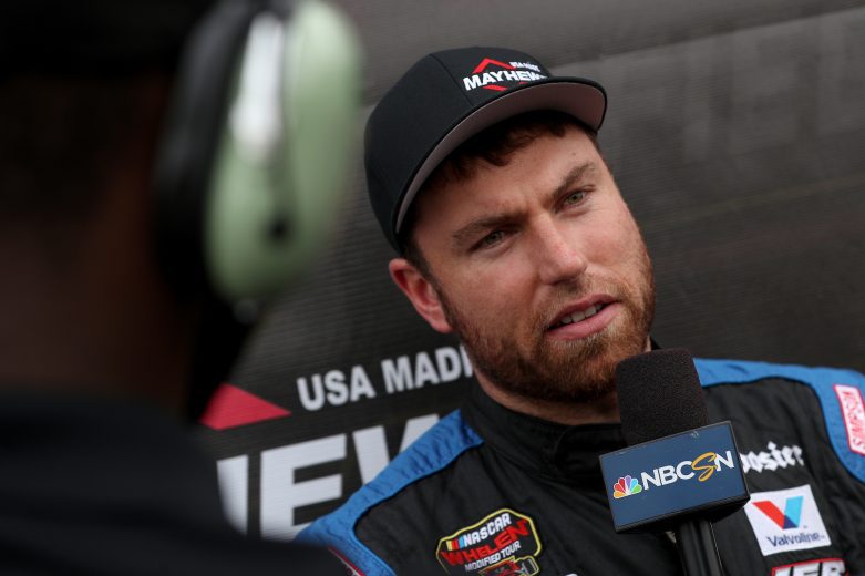 Jonathan McKennedy, driver of the #7 Ultra Wheel Troyer, is interview after winning the Mayhew Pole Award prior to the Nu Way Auto Parts 150 for the NASCAR Whelen Modified Tour at New York International Raceway Park in Lancaster, New York on July 31, 2021. (Bryan Bennett/NASCAR)