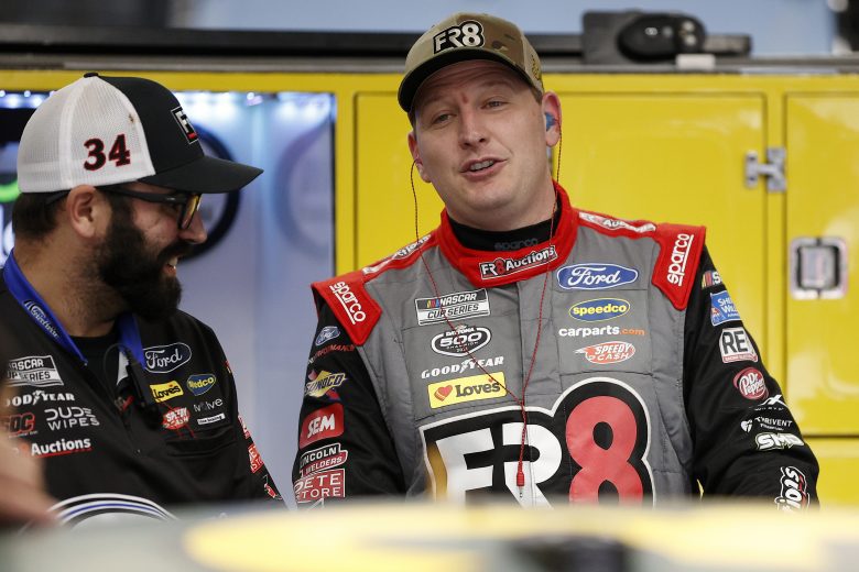 CONCORD, NORTH CAROLINA - MAY 28: Michael McDowell, driver of the #34 Fr8Auctions Ford, talks in the garage area during practice for the NASCAR Cup Series Coca-Cola 600 at Charlotte Motor Speedway on May 28, 2021 in Concord, North Carolina. (Photo by Maddie Meyer/Getty Images) | Getty Images