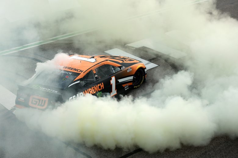 HAMPTON, GEORGIA - JULY 11: Kurt Busch, driver of the #1 GEARWRENCH Chevrolet, celebrates with a burnout after winning the NASCAR Cup Series Quaker State 400 presented by Walmart at Atlanta Motor Speedway on July 11, 2021 in Hampton, Georgia. (Photo by Sean Gardner/Getty Images) | Getty Images