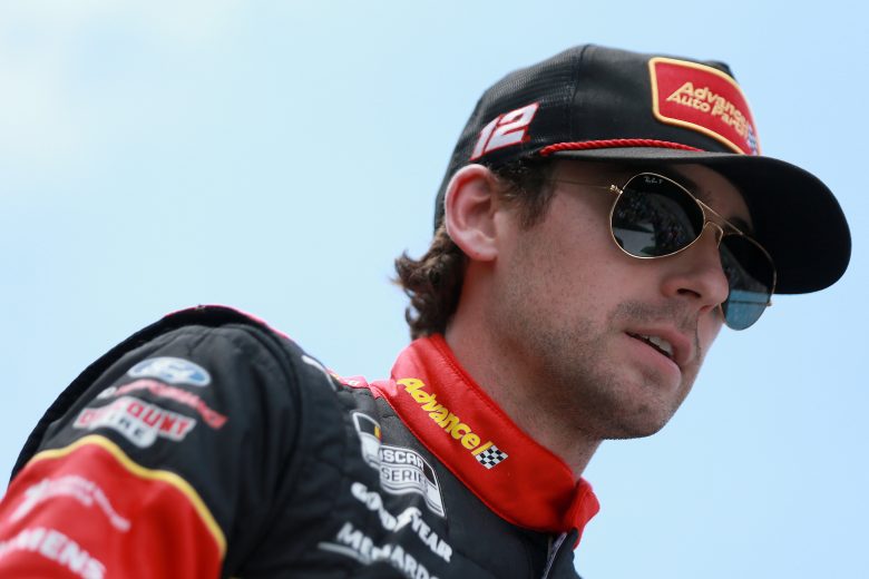 HAMPTON, GEORGIA - JULY 11: Ryan Blaney, driver of the #12 Advance Auto Parts Ford, walks the stage during pre-race ceremonies prior to the NASCAR Cup Series Quaker State 400 presented by Walmart at Atlanta Motor Speedway on July 11, 2021 in Hampton, Georgia. (Photo by Sean Gardner/Getty Images) | Getty Images