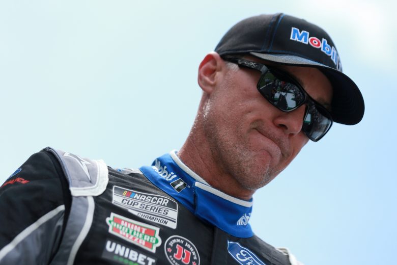 HAMPTON, GEORGIA - JULY 11: Kevin Harvick, driver of the #4 Mobil 1 Summer Road Trip Ford, walks the stage during pre-race ceremonies prior to the NASCAR Cup Series Quaker State 400 presented by Walmart at Atlanta Motor Speedway on July 11, 2021 in Hampton, Georgia. (Photo by Sean Gardner/Getty Images) | Getty Images