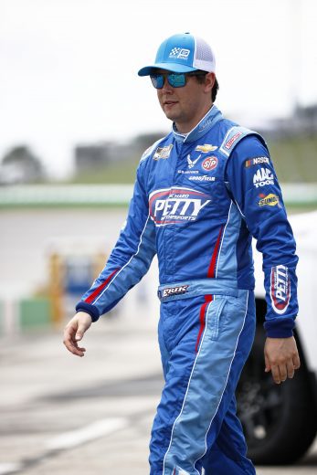HAMPTON, GEORGIA - JULY 11: Erik Jones, driver of the #43 Petty's Garage Chevrolet, walks the grid prior to the NASCAR Cup Series Quaker State 400 presented by Walmart at Atlanta Motor Speedway on July 11, 2021 in Hampton, Georgia. (Photo by Jared C. Tilton/Getty Images) | Getty Images