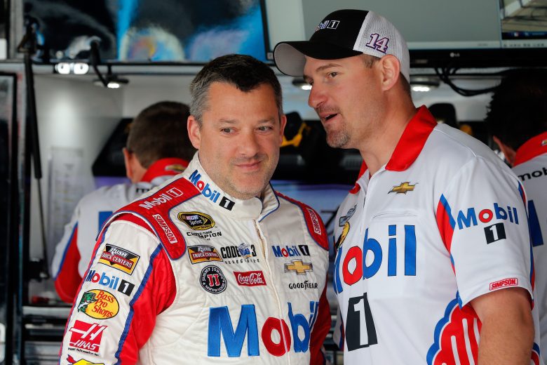 RICHMOND, VA - APRIL 22: (L-R) Tony Stewart, driver of the #14 Mobil 1 Advanced Fuel Economy Chevrolet, talks crew chief Mike Bugarewicz during practice for the NASCAR Sprint Cup Series TOYOTA OWNERS 400 at Richmond International Raceway on April 22, 2016 in Richmond, Virginia. (Photo by Brian Lawdermilk/Getty Images) | Getty Images