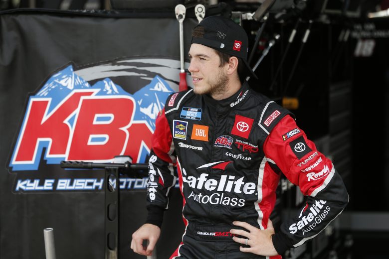 CONCORD, NORTH CAROLINA - MAY 28: Chandler Smith, driver of the #18 Safelite AutoGlass Toyota, waits in the garage area during practice for the NASCAR Camping World Truck Series North Carolina Education Lottery 200 at Charlotte Motor Speedway on May 28, 2021 in Concord, North Carolina. (Photo by Brian Lawdermilk/Getty Images) | Getty Images