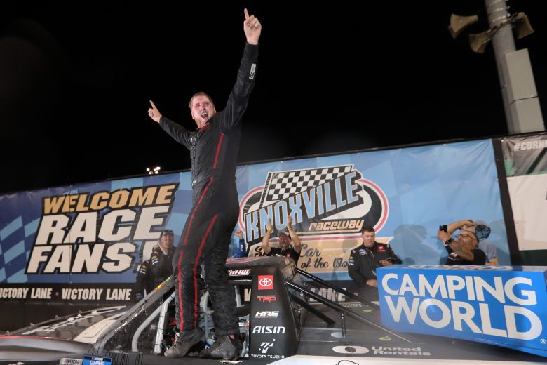 KNOXVILLE, IOWA - JULY 09: Austin Hill, driver of the #16 Toyota Mobility Parts/Tochigi/Fukishima Toyota, celebrates in victory lane after winning the NASCAR Camping World Truck Series Corn Belt 150 presented by Premier Chevy Dealers at Knoxville Raceway on July 09, 2021 in Knoxville, Iowa. (Photo by James Gilbert/Getty Images) | Getty Images