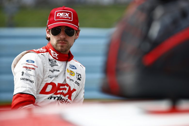 WATKINS GLEN, NEW YORK - AUGUST 08: Ryan Blaney, driver of the #12 DEX Imaging Ford, waits on the grid prior to the NASCAR Cup Series Go Bowling at The Glen at Watkins Glen International on August 08, 2021 in Watkins Glen, New York. (Photo by Jared C. Tilton/Getty Images) | Getty Images