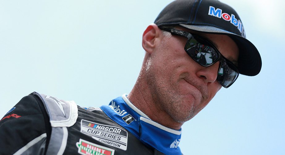 HAMPTON, GEORGIA - JULY 11: Kevin Harvick, driver of the #4 Mobil 1 Summer Road Trip Ford, walks the stage during pre-race ceremonies prior to the NASCAR Cup Series Quaker State 400 presented by Walmart at Atlanta Motor Speedway on July 11, 2021 in Hampton, Georgia. (Photo by Sean Gardner/Getty Images) | Getty Images