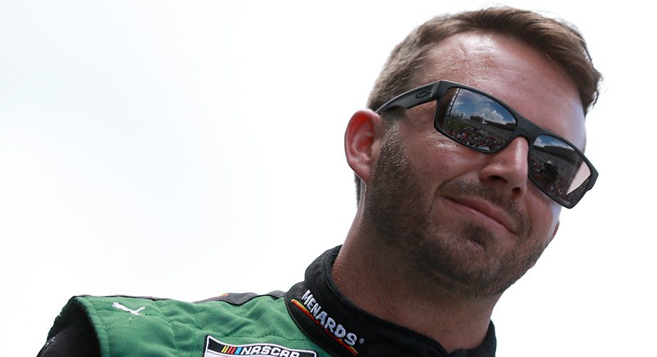 HAMPTON, GEORGIA - JULY 11: Matt DiBenedetto, driver of the #21 Menards/Quaker State Ford, walks the stage during pre-race ceremonies prior to the NASCAR Cup Series Quaker State 400 presented by Walmart at Atlanta Motor Speedway on July 11, 2021 in Hampton, Georgia. (Photo by Sean Gardner/Getty Images) | Getty Images