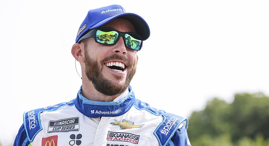 ELKHART LAKE, WISCONSIN - JULY 04: Ross Chastain, driver of the #42 AdventHealth Chevrolet, laughs on the grid during qualifying for the NASCAR Cup Series Jockey Made in America 250 Presented by Kwik Trip at Road America on July 04, 2021 in Elkhart Lake, Wisconsin. (Photo by James Gilbert/Getty Images) | Getty Images