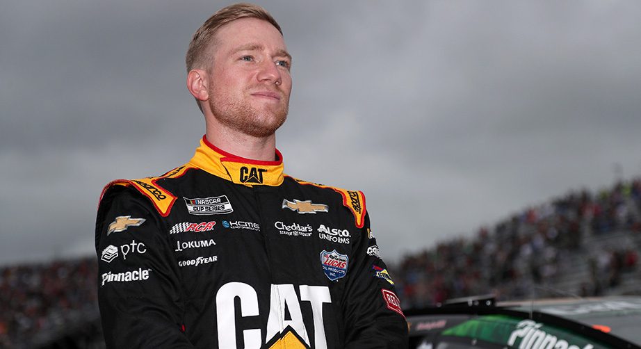 LOUDON, NEW HAMPSHIRE - JULY 18: Tyler Reddick, driver of the #8 Cat #WeDigLandscaping Chevrolet, stands on the grid during pre-race ceremonies prior to the NASCAR Cup Series  Foxwoods Resort Casino 301 at New Hampshire Motor Speedway on July 18, 2021 in Loudon, New Hampshire. (Photo by James Gilbert/Getty Images) | Getty Images