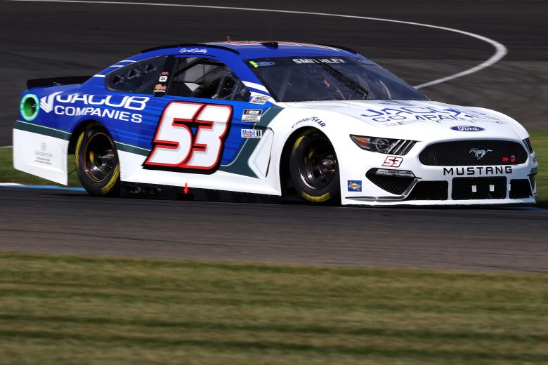 INDIANAPOLIS, INDIANA - AUGUST 14: Garrett Smithley, driver of the #53 Jacob Companies Ford, drives during practice for the NASCAR Cup Series Verizon 200 at the Brickyard at Indianapolis Motor Speedway on August 14, 2021 in Indianapolis, Indiana. (Photo by Stacy Revere/Getty Images) | Getty Images