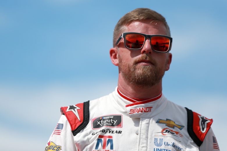 INDIANAPOLIS, INDIANA - AUGUST 14: Justin Allgaier, driver of the #7 BRANDT Chevrolet, waits on the grid prior to the NASCAR Xfinity Series Pennzoil 150 at the Brickyard at Indianapolis Motor Speedway on August 14, 2021 in Indianapolis, Indiana. (Photo by Sean Gardner/Getty Images) | Getty Images