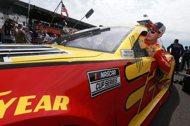 INDIANAPOLIS, INDIANA - AUGUST 15: Joey Logano, driver of the #22 Shell Pennzoil Ford, enters his car to start the NASCAR Cup Series Verizon 200 at the Brickyard at Indianapolis Motor Speedway on August 15, 2021 in Indianapolis, Indiana. (Photo by Sean Gardner/Getty Images) | Getty Images