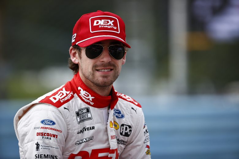 WATKINS GLEN, NEW YORK - AUGUST 08: Ryan Blaney, driver of the #12 DEX Imaging Ford, waits on the grid prior to the NASCAR Cup Series Go Bowling at The Glen at Watkins Glen International on August 08, 2021 in Watkins Glen, New York. (Photo by Jared C. Tilton/Getty Images) | Getty Images