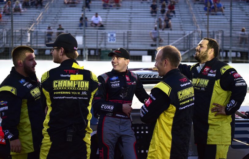 MADISON, ILLINOIS - AUGUST 20: Christian Eckes, driver of the #98 TSPORT/Curb Records Toyota, and crew wait on the grid prior to the NASCAR Camping World Truck Series Toyota 200 presented by CK Power at Gateway at Gateway Motorsports Park on August 20, 2021 in Madison, Illinois. (Photo by Jeff Curry/Getty Images) | Getty Images