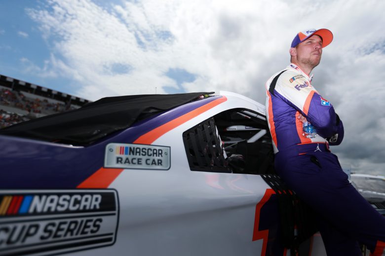 LONG POND, PENNSYLVANIA - JUNE 26: Denny Hamlin, driver of the #11 FedEx Ground Toyota, waits on the grid prior to the NASCAR Cup Series Pocono Organics CBD 325 at Pocono Raceway on June 26, 2021 in Long Pond, Pennsylvania. (Photo by Sean Gardner/Getty Images) | Getty Images